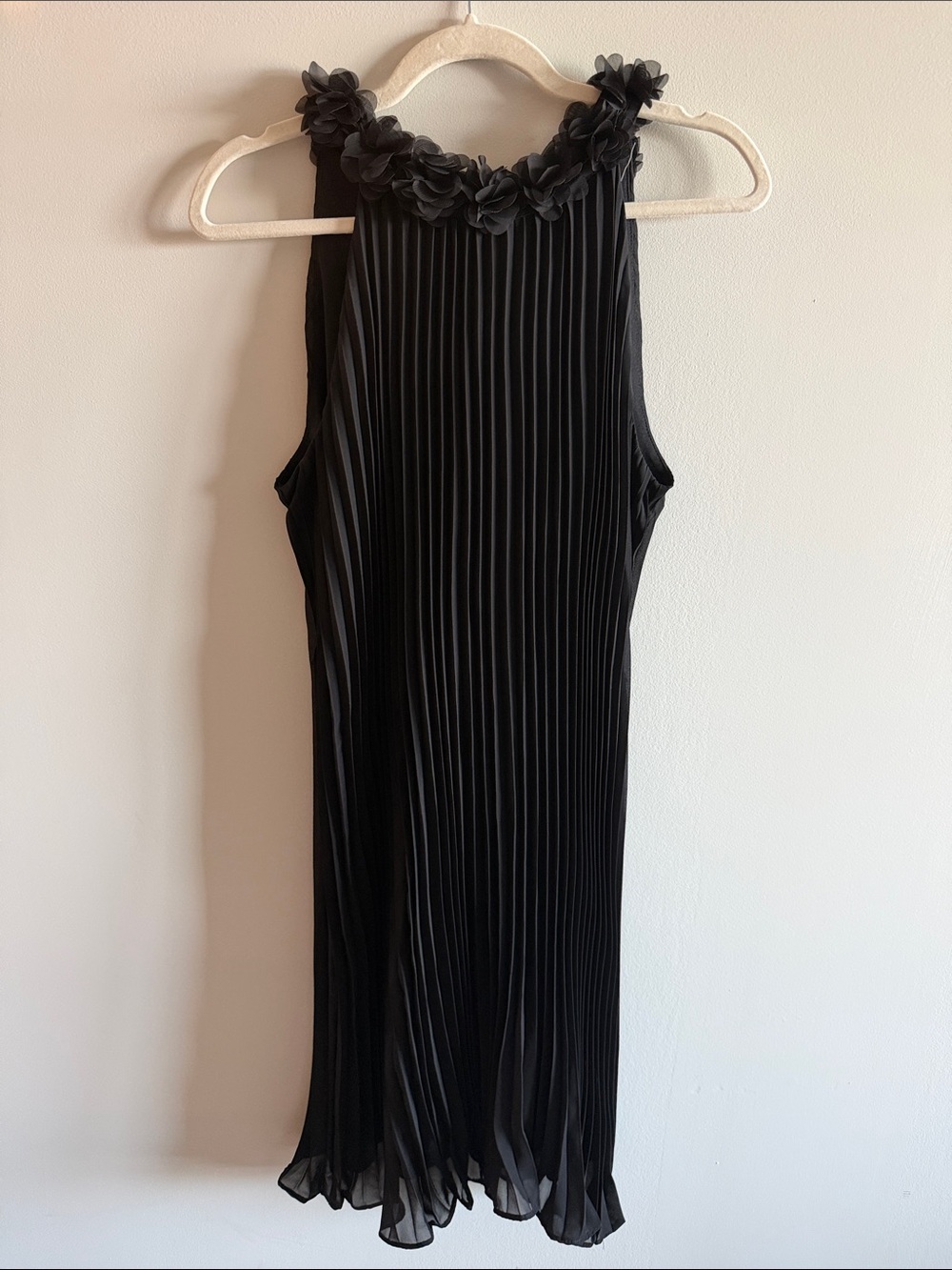 Sleeveless Black Pleated Dress with Floral Neckline